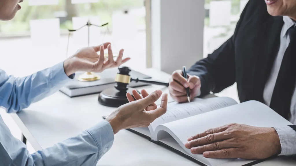 Professional consultation showing how lawsuit dismissed online reputation can be restored through strategic documentation and SEO optimization